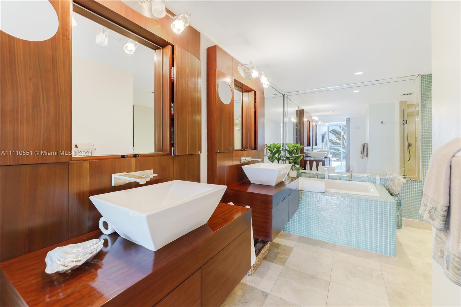 8925 Collins Avenue, Unit 5E Surfside, FL 33154 - Photo 26 of 54 a view of a living room and dining room