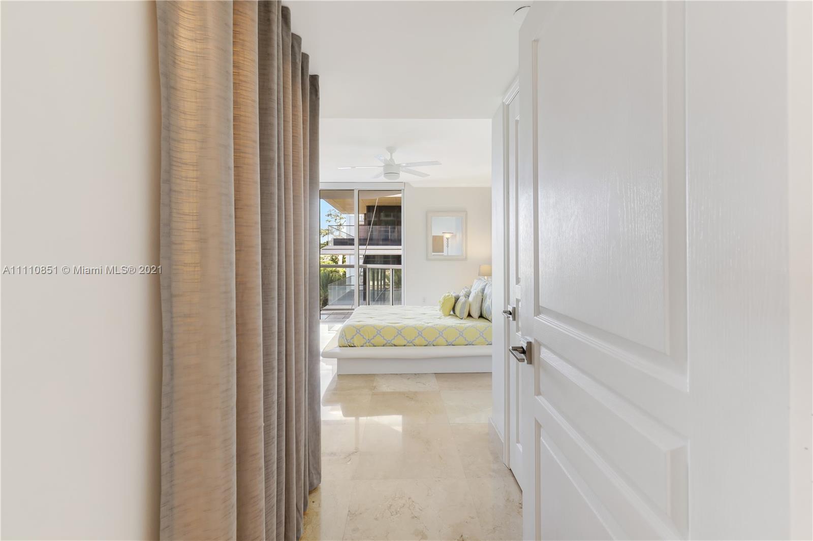 8925 Collins Avenue, Unit 5E Surfside, FL 33154 - Photo 31 of 54 a bathroom with bathtub and shower