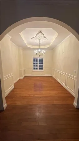 a view of a swimming pool with an outdoor space and seating area