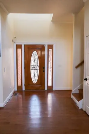 a view of street with wooden fence
