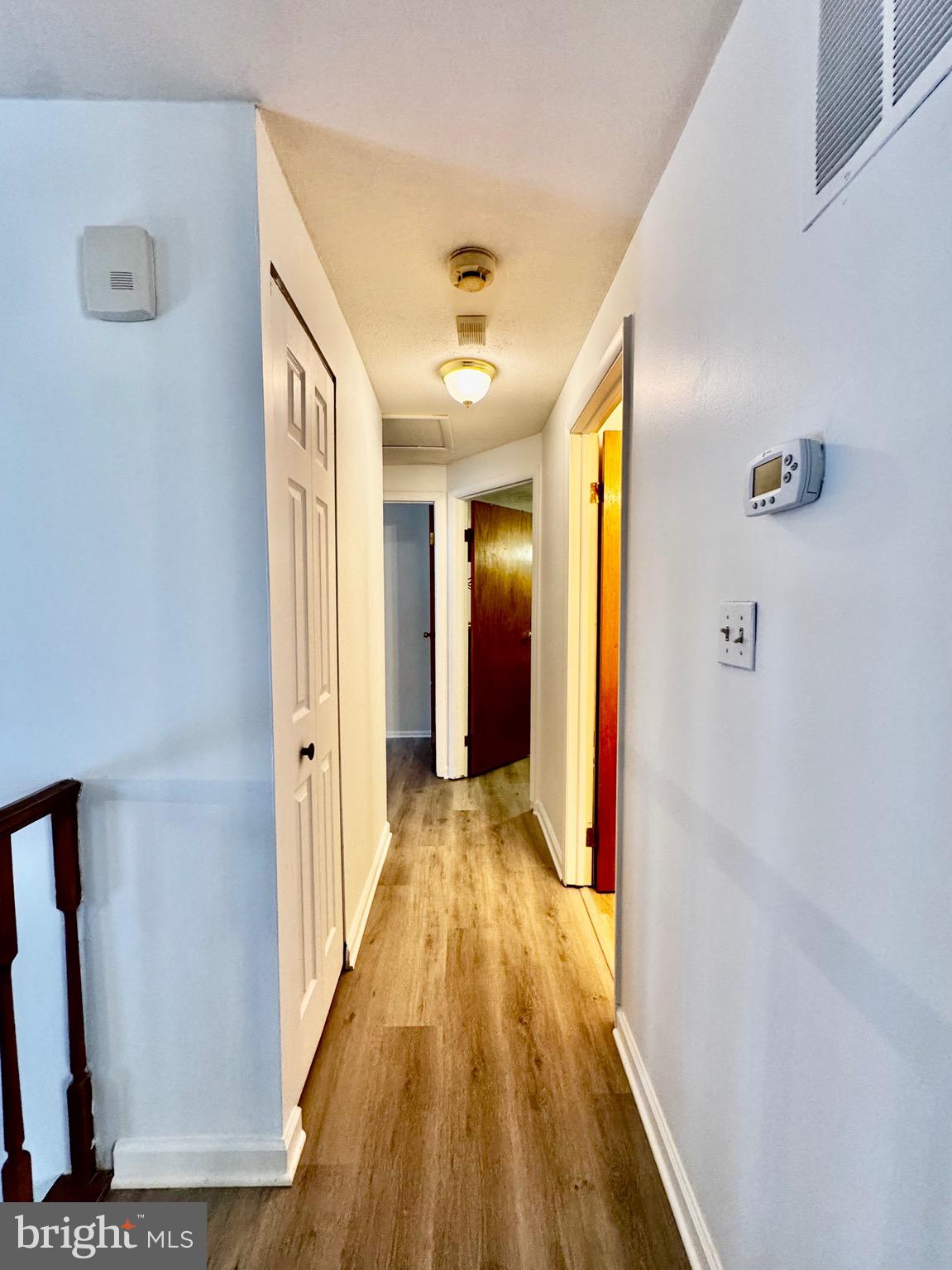 7854 Tick Neck Road Pasadena, MD 21122 - Photo 17 of 42 hallway to bedrooms