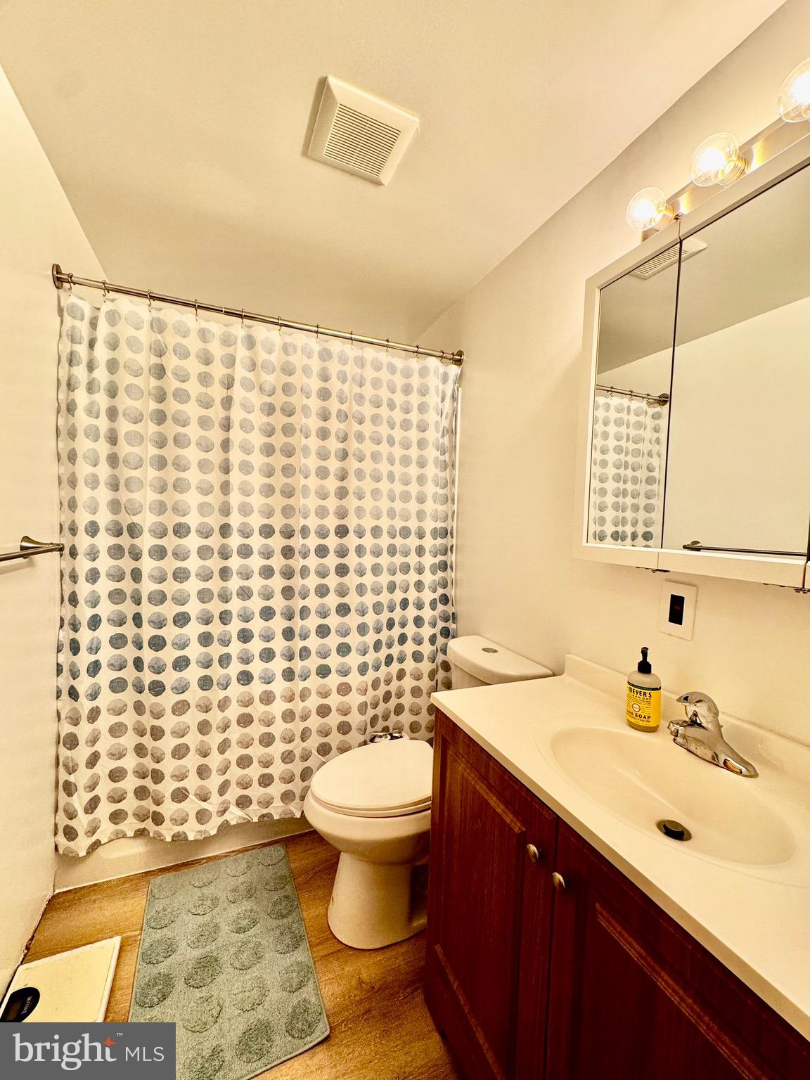 7854 Tick Neck Road Pasadena, MD 21122 - Photo 18 of 42 Main Level Hall Full Bath