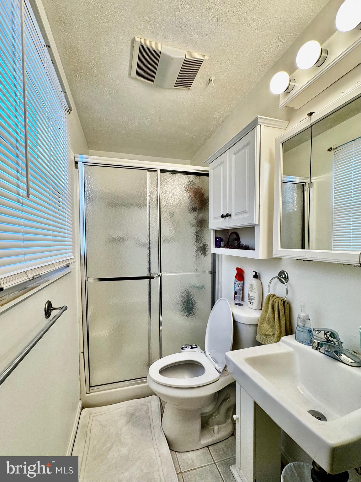 7854 Tick Neck Road Pasadena, MD 21122 - Photo 19 of 42 Primary Bedroom Full Bath