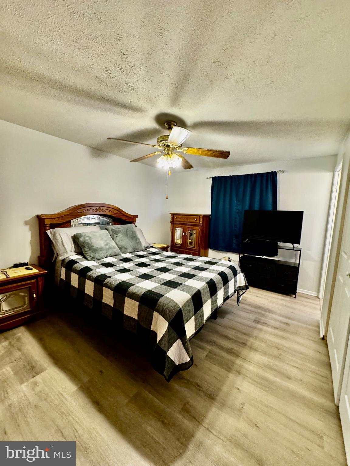 7854 Tick Neck Road Pasadena, MD 21122 - Photo 21 of 42 Primary Bedroom