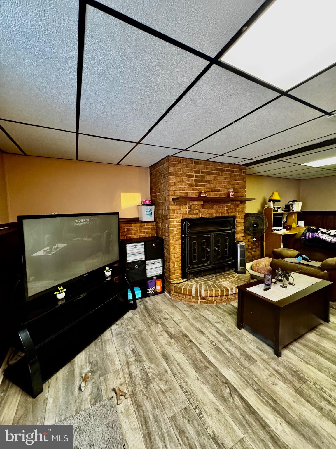 7854 Tick Neck Road Pasadena, MD 21122 - Photo 34 of 42 fireplace in basement