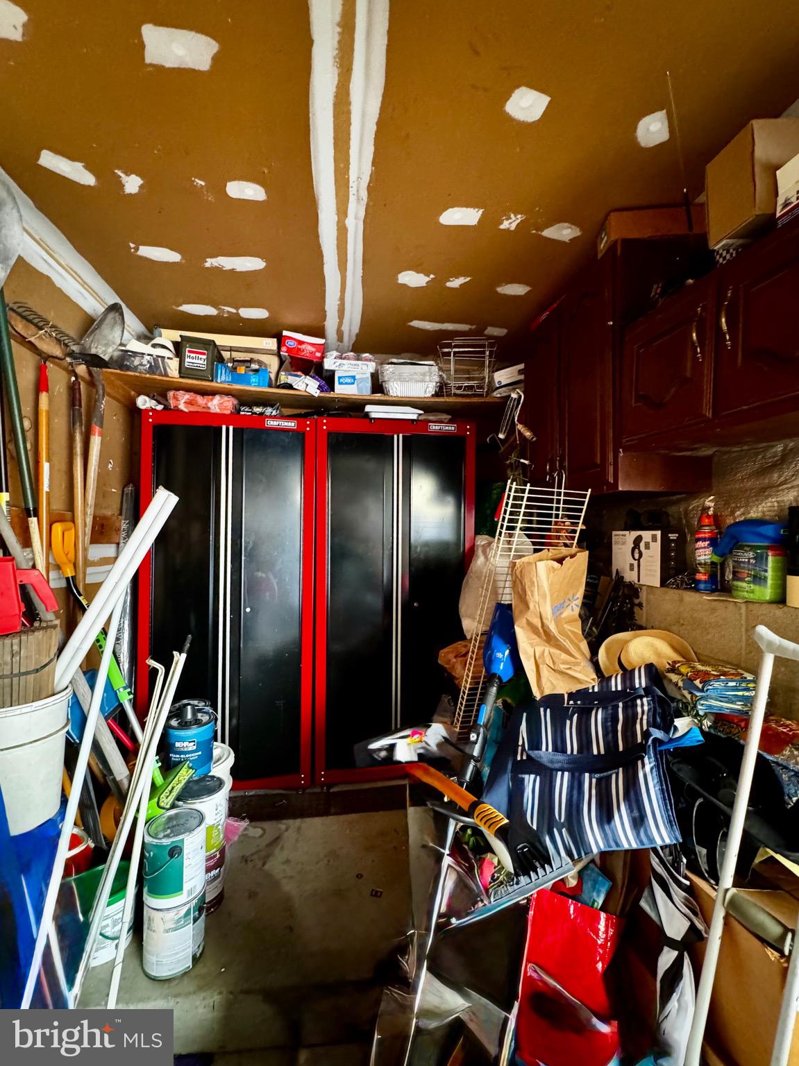 7854 Tick Neck Road Pasadena, MD 21122 - Photo 39 of 42 Large garage with storage