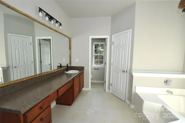 a view of a hallway with windows