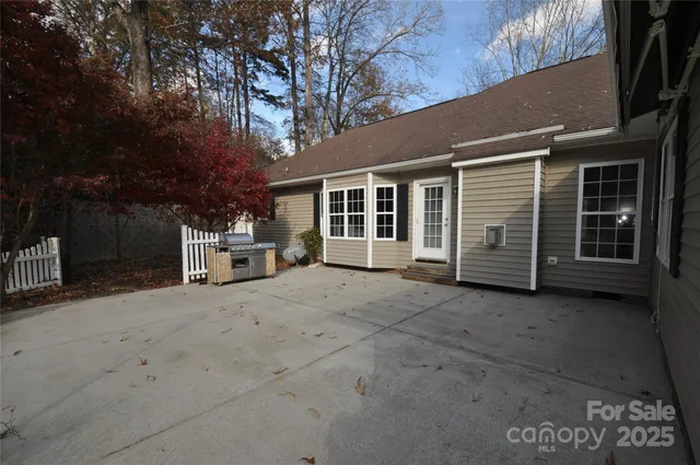 a view of a large house with a yard