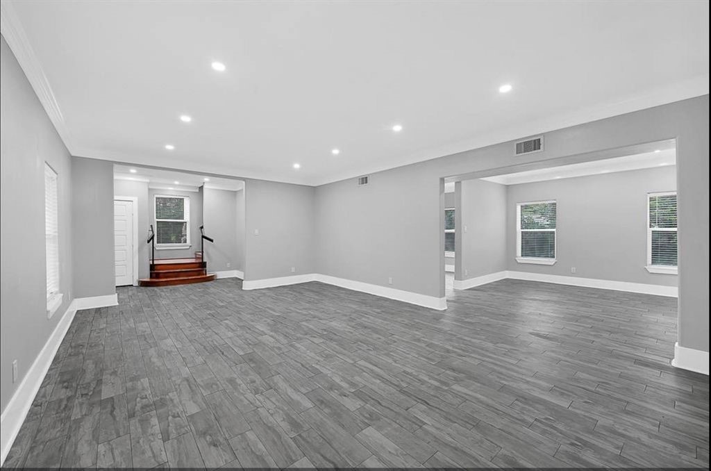12430 Pecan Court Houston, TX 77013 - Photo 6 of 10 a view of empty room with wooden floor