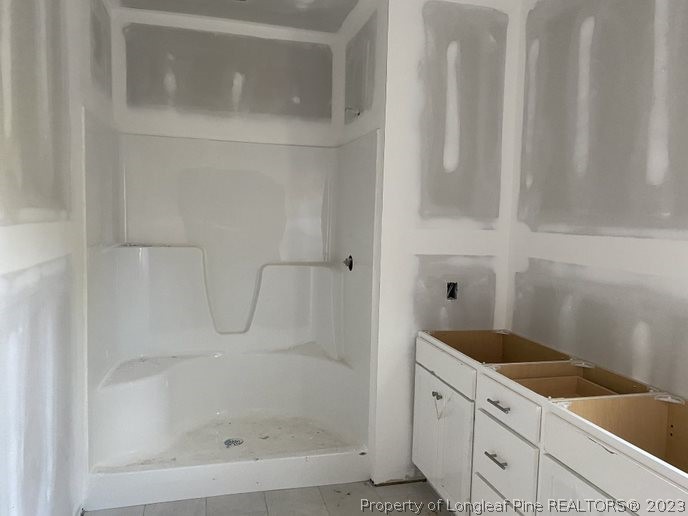 7740 Rufus Johnson Road Fayetteville, NC 28312 - Photo 6 of 11 a bathroom with a bathtub