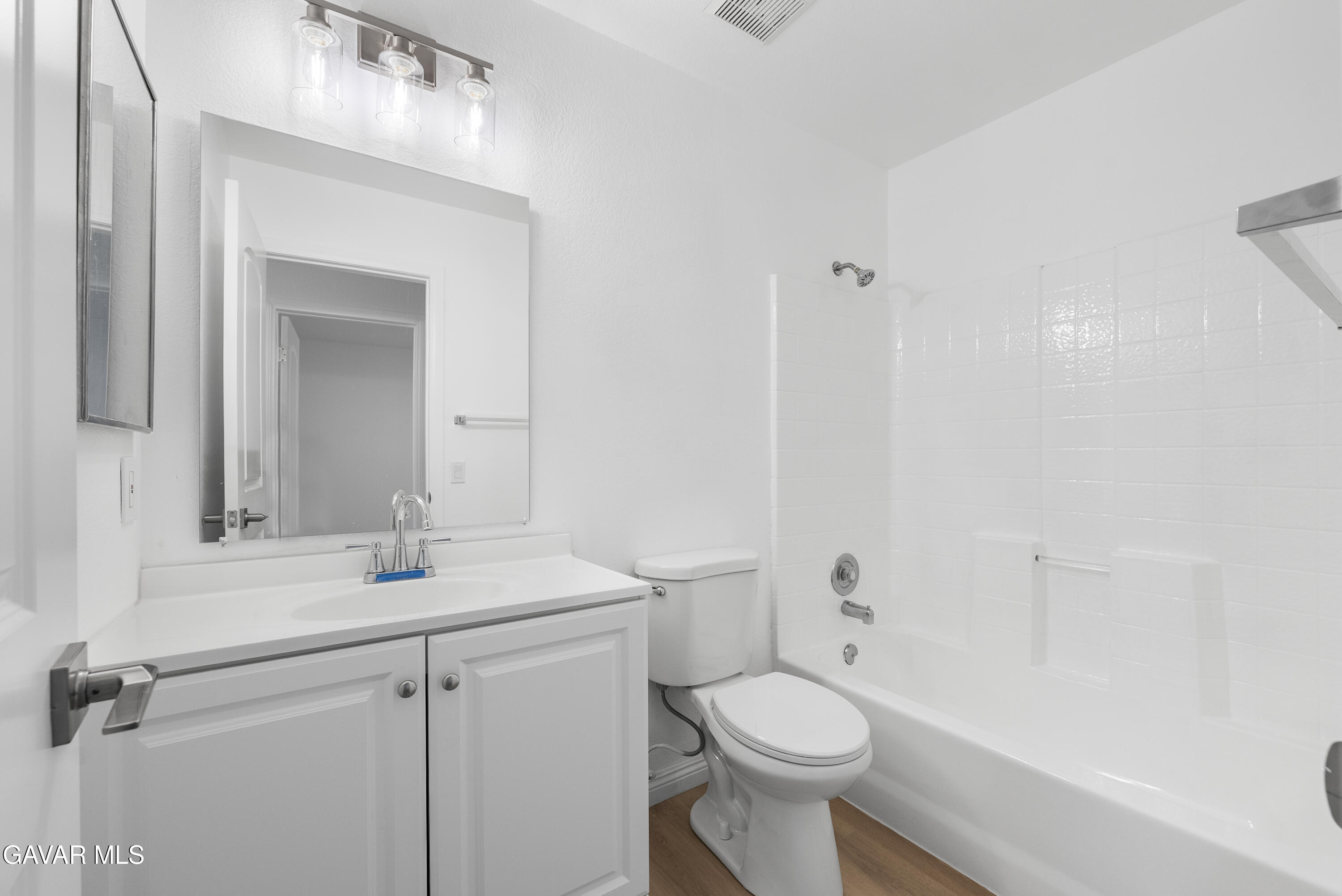 44238 Encanto Way Lancaster, CA 93536 - Photo 21 of 32 a bathroom with a sink a toilet and shower