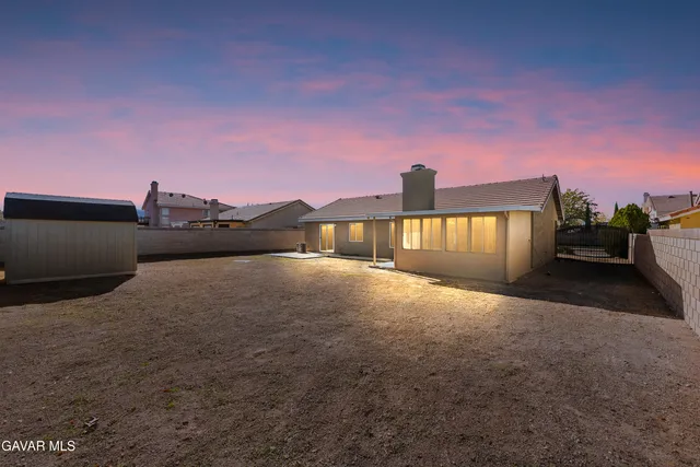 a view of a house with a street
