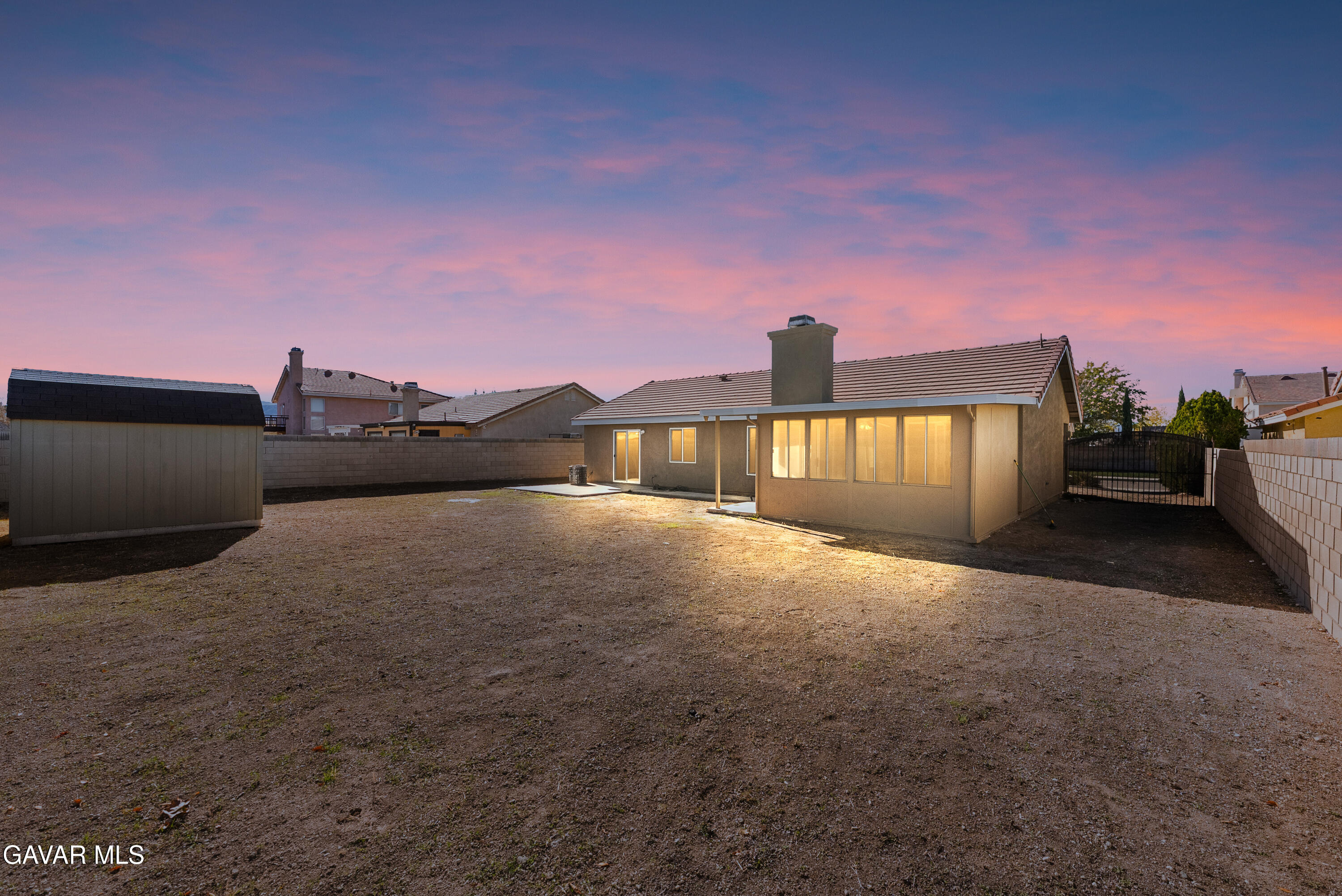 44238 Encanto Way Lancaster, CA 93536 - Photo 24 of 32 a view of a house with a street