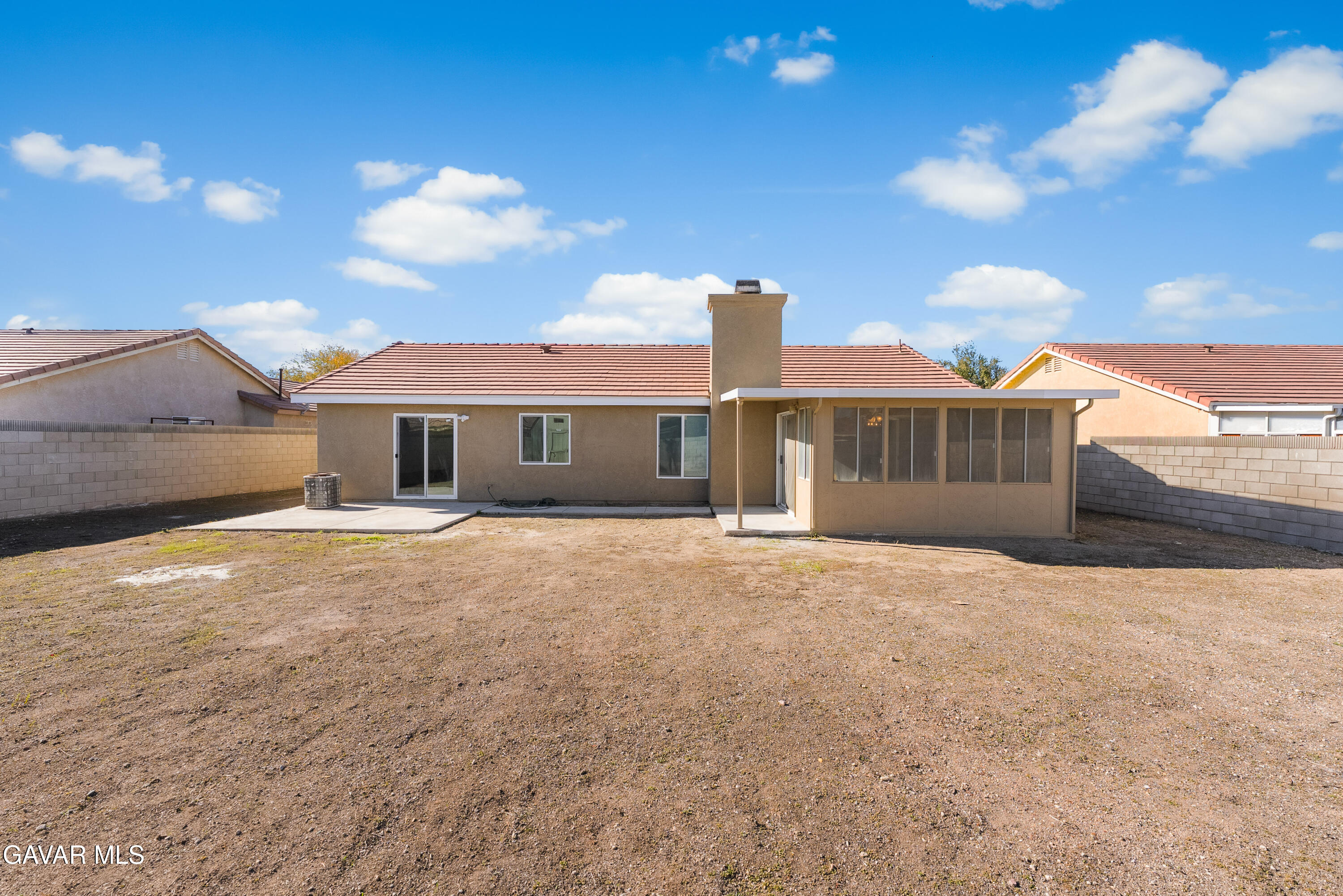 44238 Encanto Way Lancaster, CA 93536 - Photo 25 of 32 a front view of a house with a yard