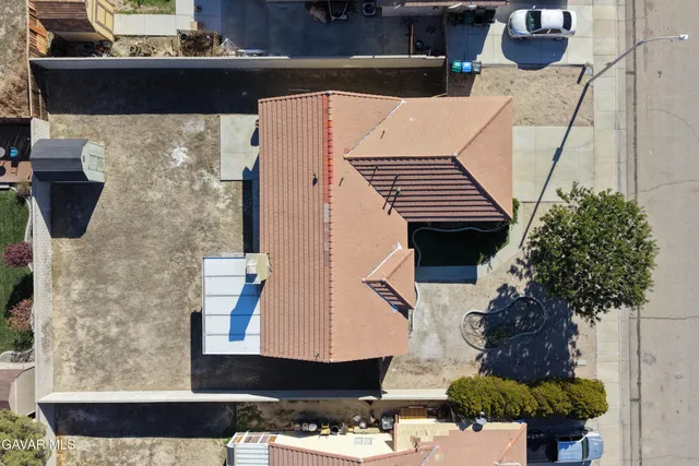 a view of a balcony with chairs