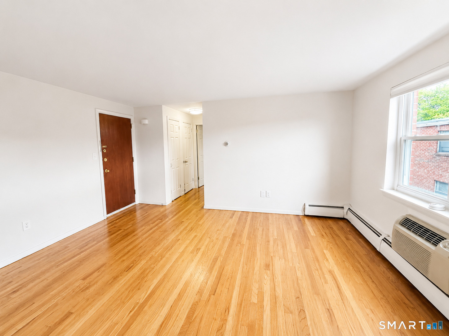 366 Park Road West Hartford, CT 06119 - Photo 4 of 8 a view of a room with wooden floor and fence