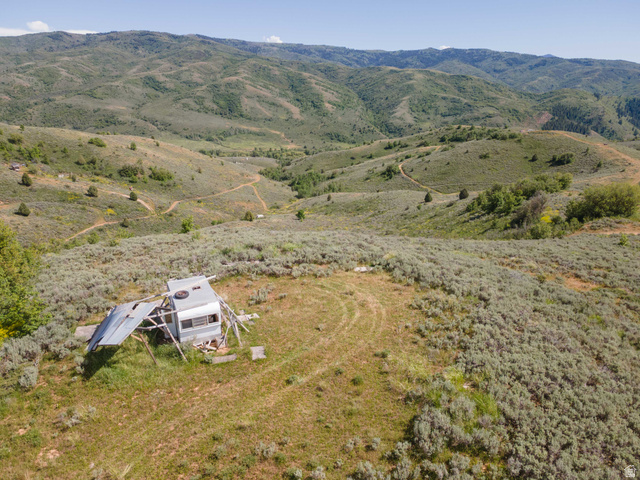 73 North River View Road, Unit 73 Huntsville, UT 84317 - Photo 16 of 21 Expansive hillside terrain featuring distant mountain ranges and scattered green foliage
