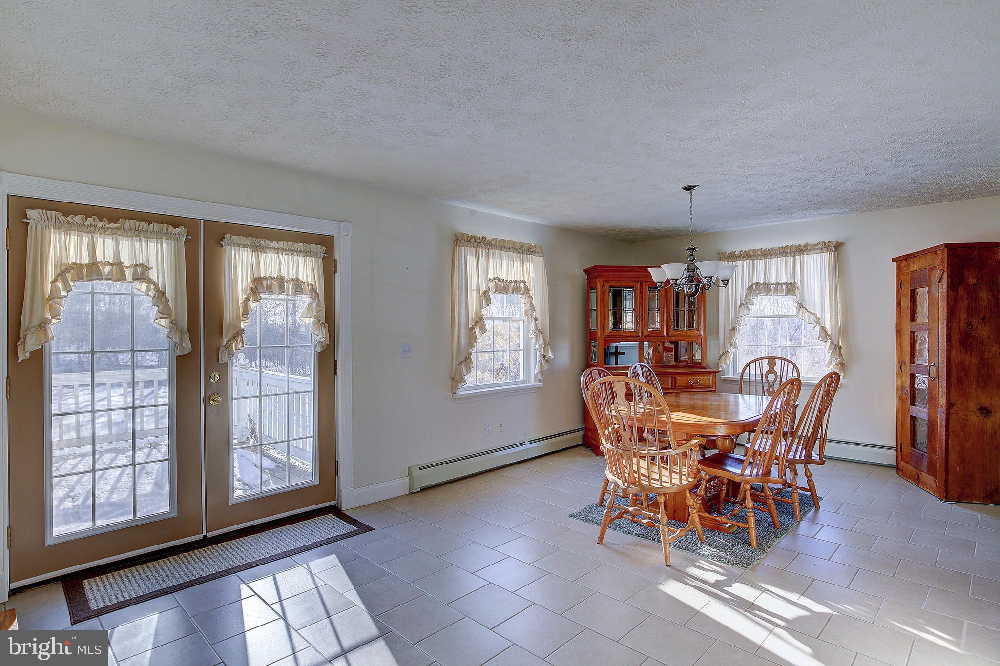 241 Earth Station Road Catawissa, PA 17820 - Photo 14 of 18 a dining room with furniture and window