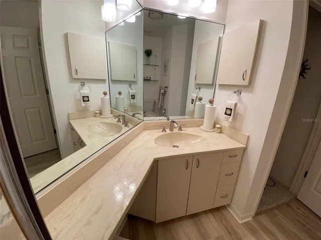 a view of a balcony with chairs