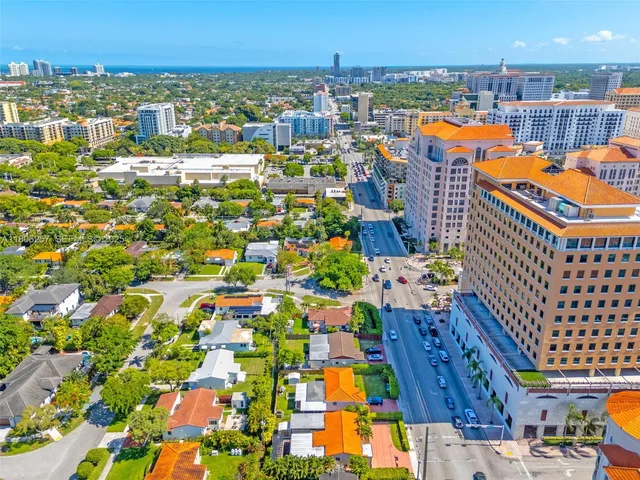 front view of a house with a garden