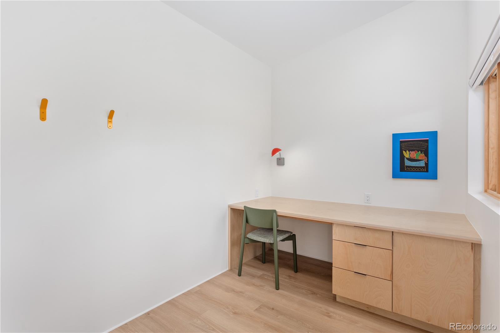 1276 Sycamore Road Crestone, CO 81131 - Photo 16 of 48 a room with cabinets and wooden floor