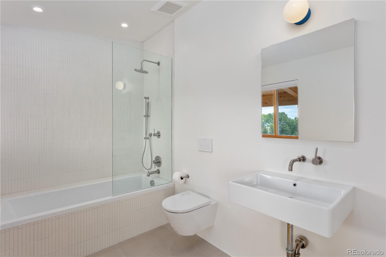 1276 Sycamore Road Crestone, CO 81131 - Photo 17 of 48 a bathroom with a sink toilet and shower