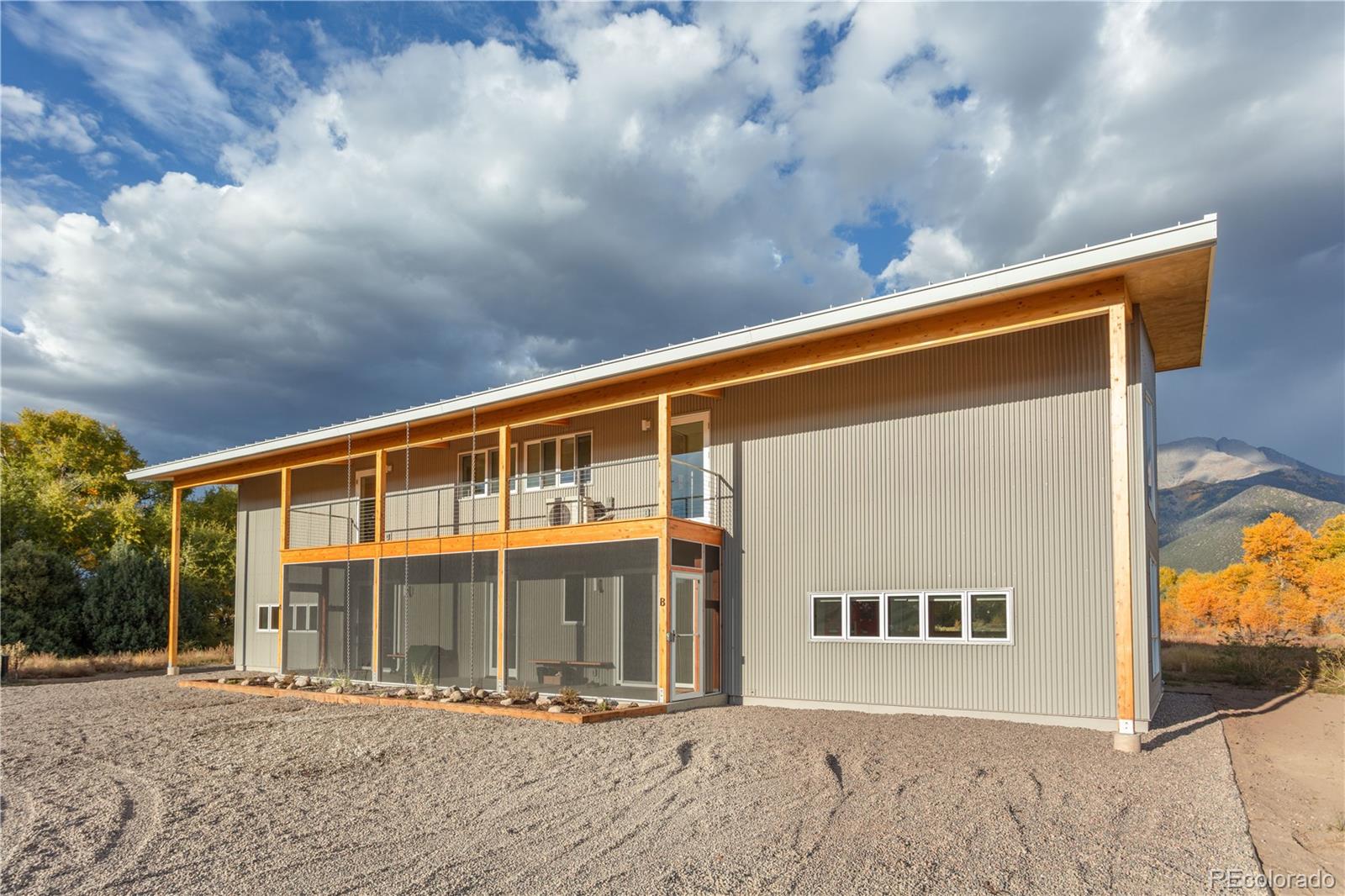 1276 Sycamore Road Crestone, CO 81131 - Photo 23 of 48 a front view of a house with a large window