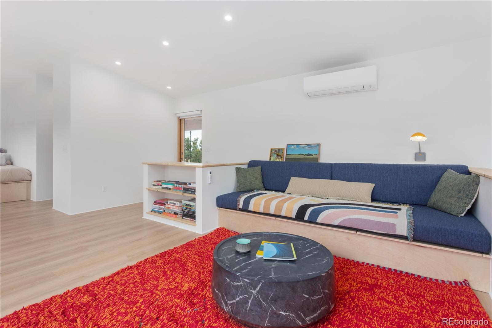 1276 Sycamore Road Crestone, CO 81131 - Photo 39 of 48 a living room with furniture and a wooden floor