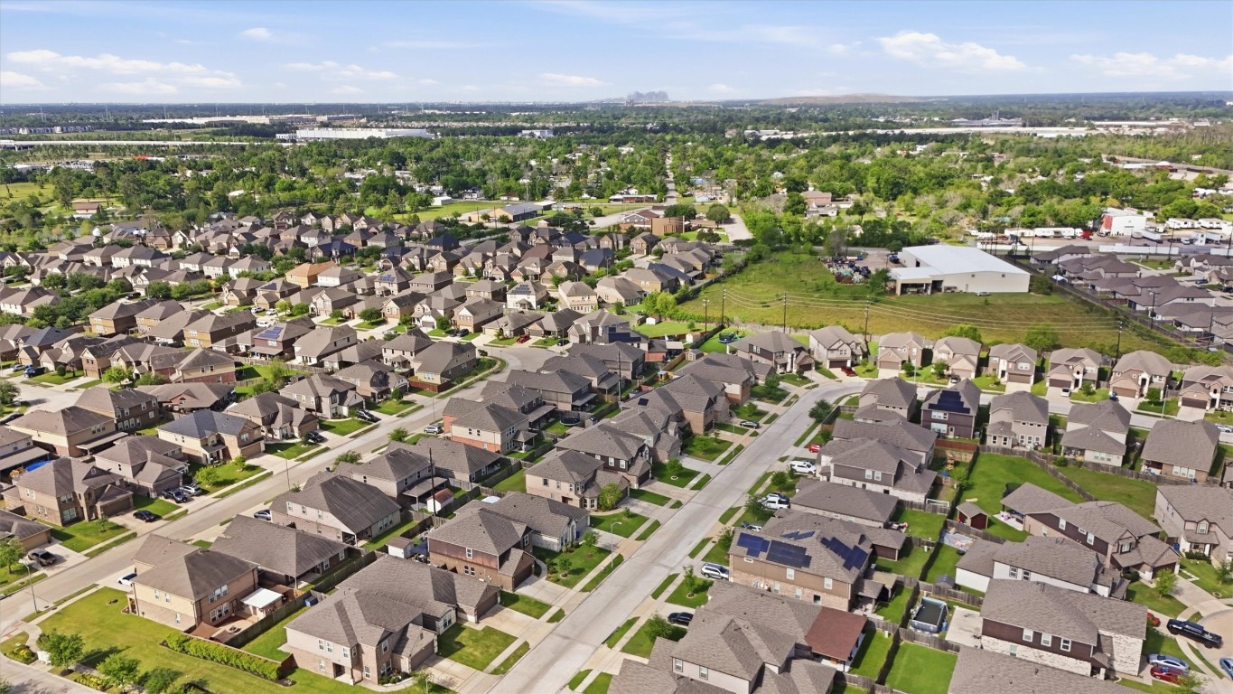 14706 Ruddy Duck Lane Houston, TX 77049 - Photo 31 of 32 an aerial view of residential houses with outdoor space