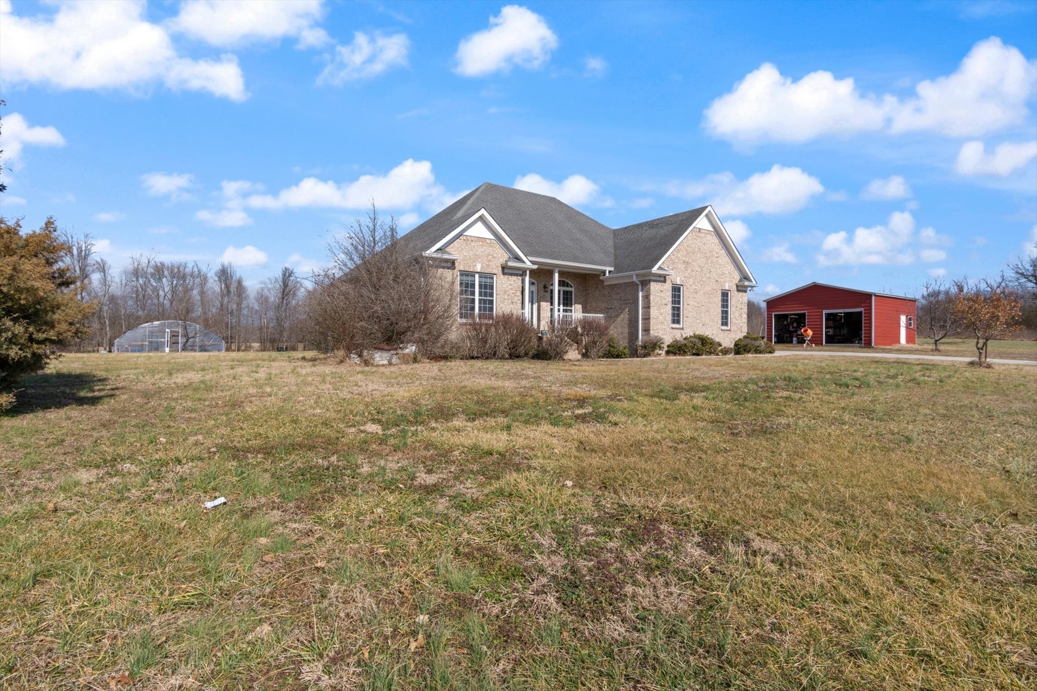 5087 Asbury Road Manchester, TN 37355 - Photo 2 of 33 a view of a house with a yard
