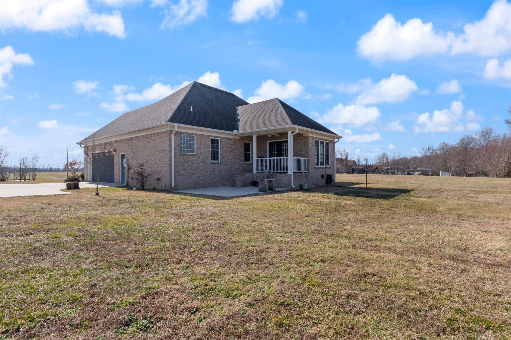 5087 Asbury Road Manchester, TN 37355 - Photo 3 of 33 a view of a house with a yard