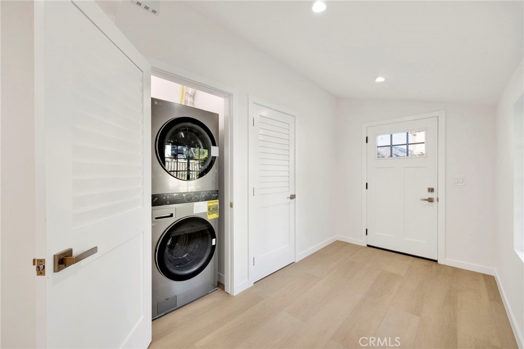 7118 Apperson Street Tujunga, CA 91042 - Photo 11 of 25 a view of a livingroom with washer and dryer