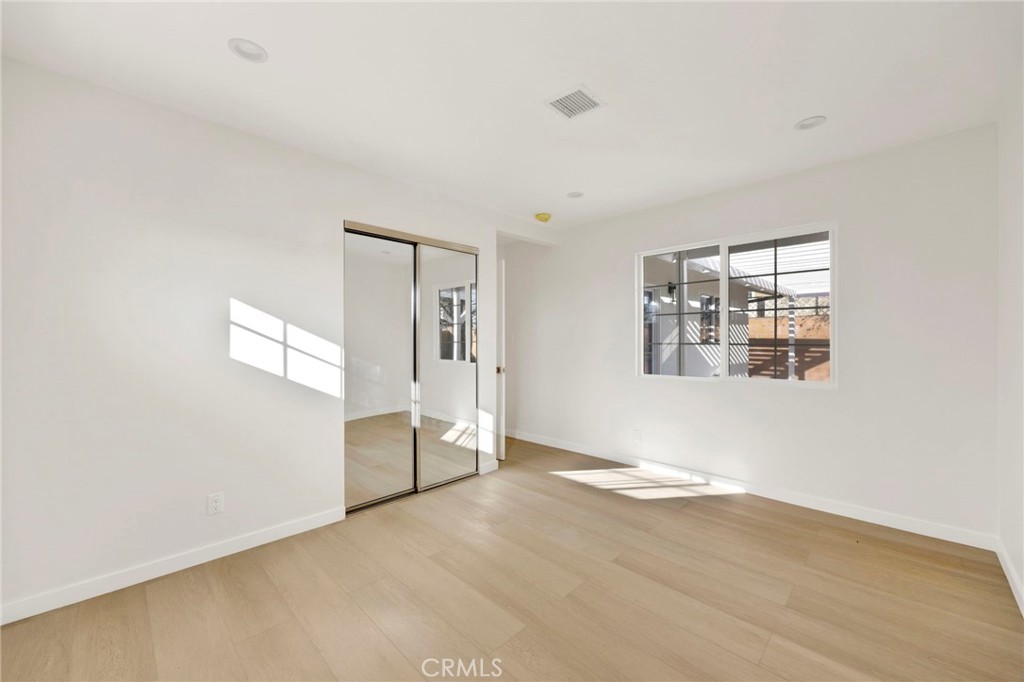 7118 Apperson Street Tujunga, CA 91042 - Photo 16 of 25 an empty room with windows