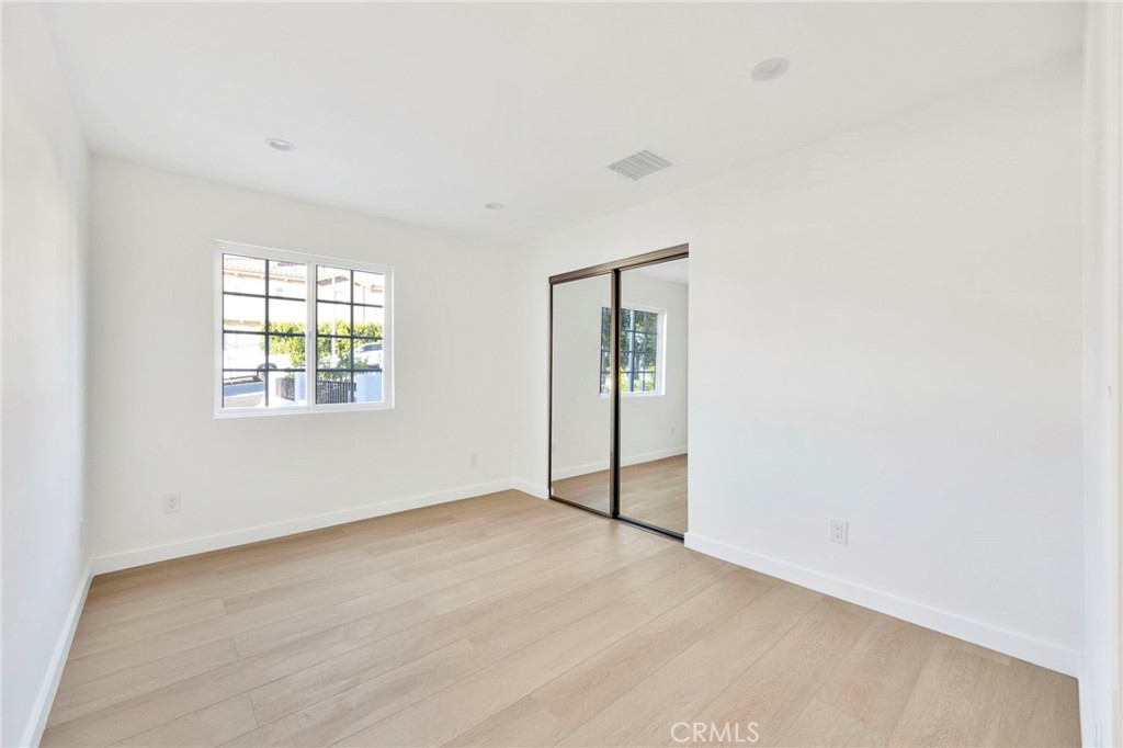 7118 Apperson Street Tujunga, CA 91042 - Photo 21 of 25 an empty room with windows