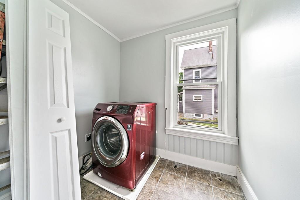 12 Madison Street Taunton, MA 02780 - Photo 14 of 23 a utility room with dryer and washer