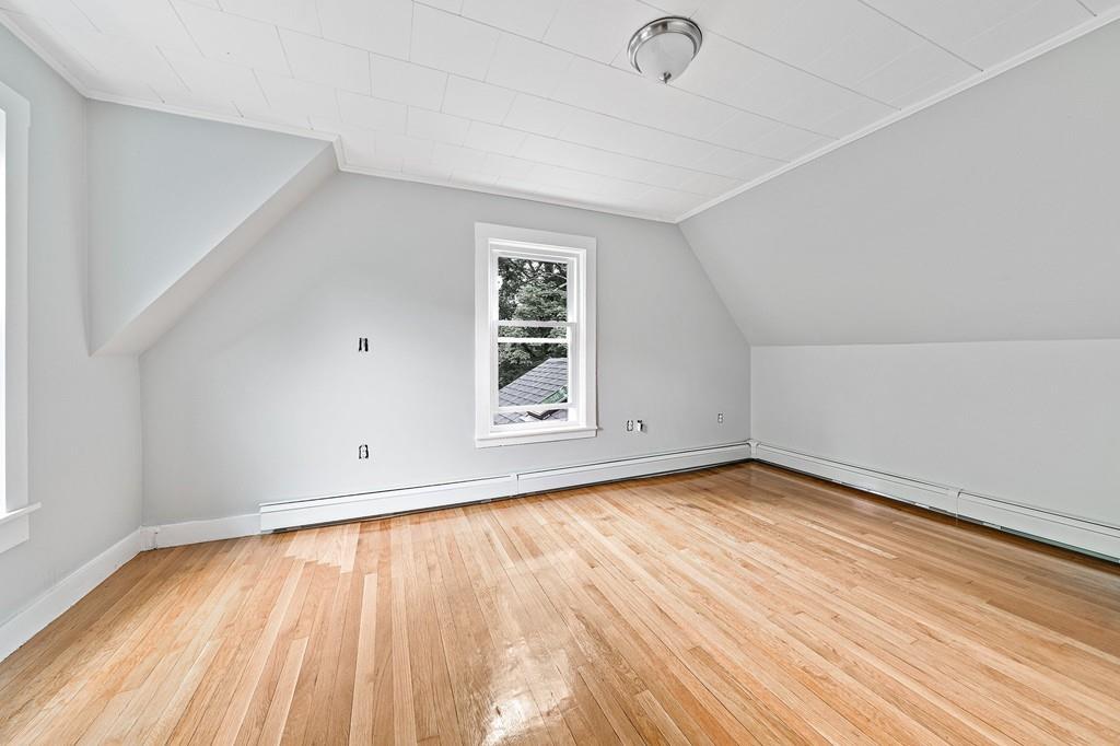 12 Madison Street Taunton, MA 02780 - Photo 16 of 23 a view of a room with wooden floor and window