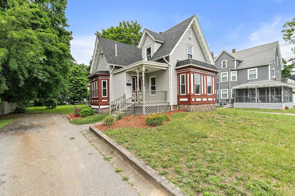 12 Madison Street Taunton, MA 02780 - Photo 2 of 23 a front view of a house with garden