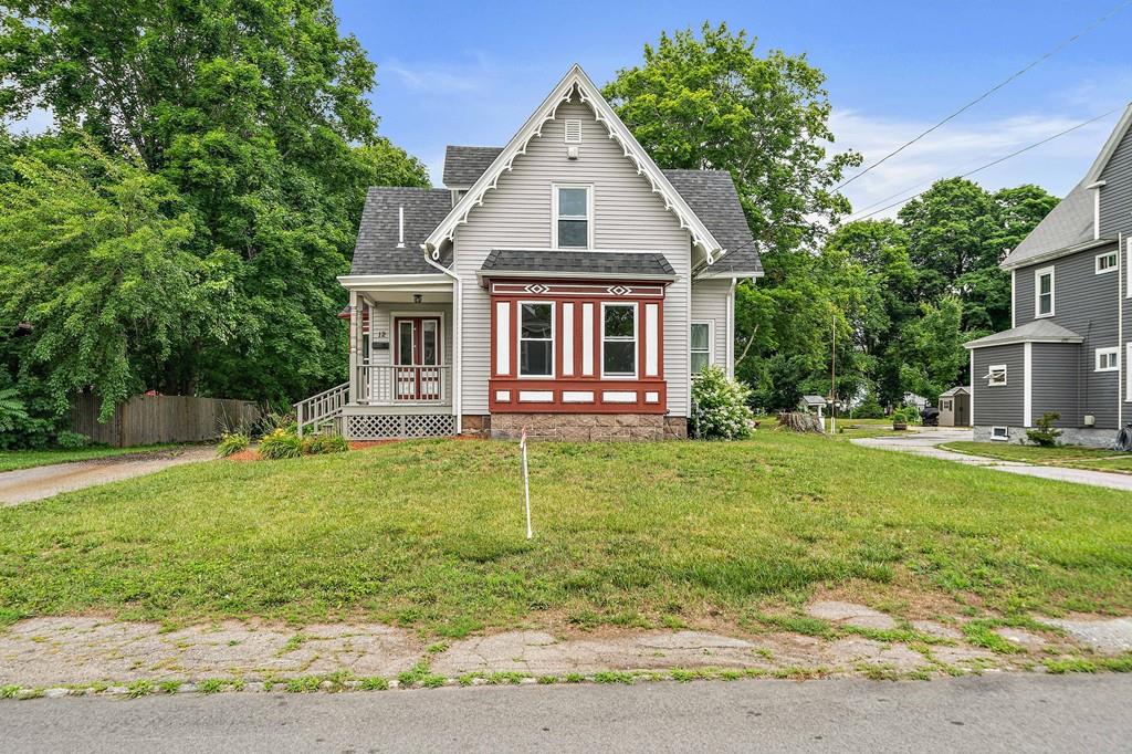 12 Madison Street Taunton, MA 02780 - Photo 23 of 23 a front view of a house with a yard