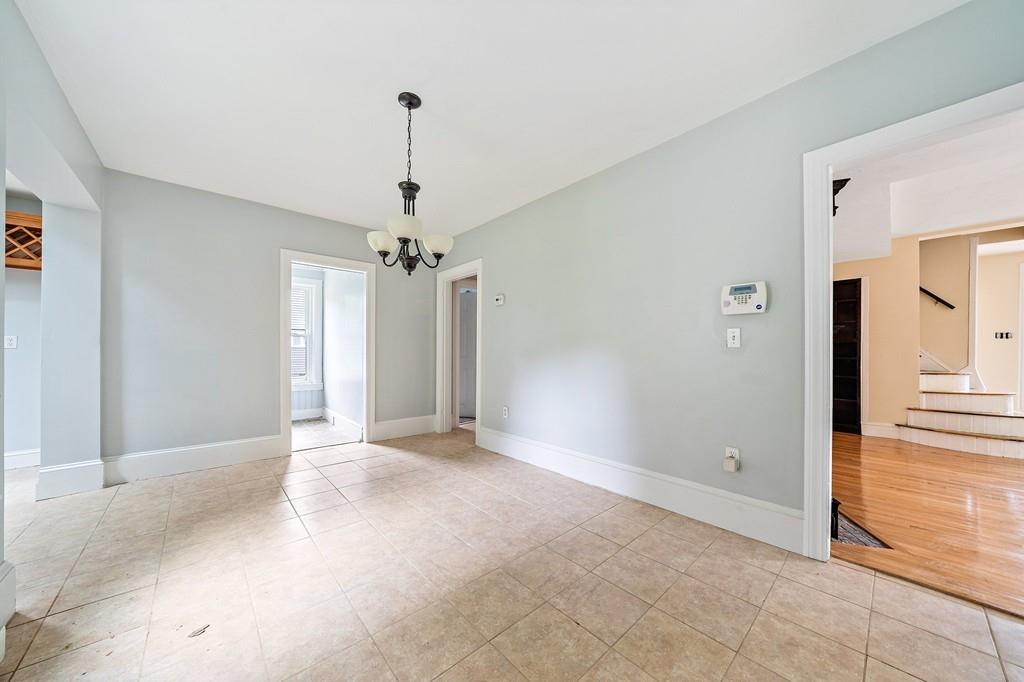 12 Madison Street Taunton, MA 02780 - Photo 6 of 23 a view of an empty room with a window