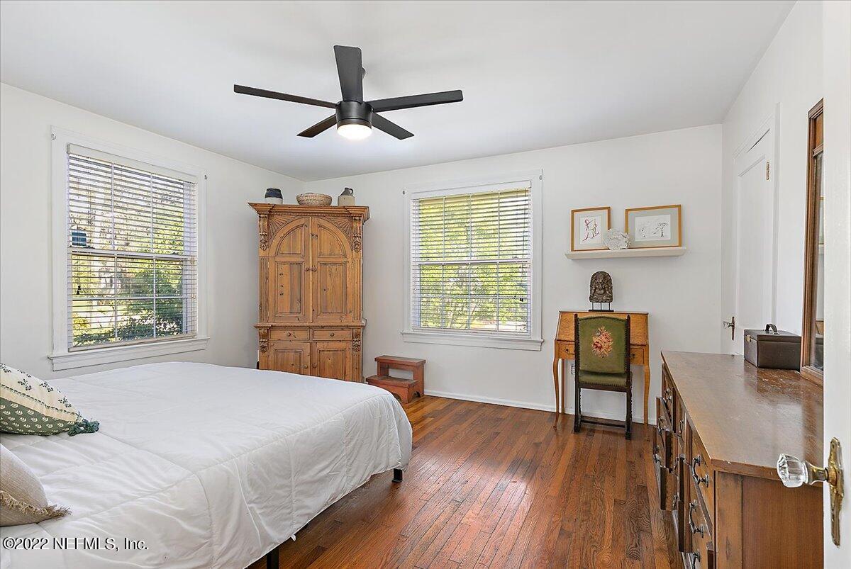 1626 Brookwood Road Jacksonville, FL 32207 - Photo 12 of 27 a bedroom with a bed window and a desk