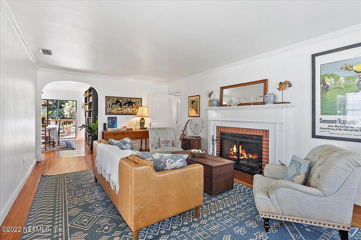 1626 Brookwood Road Jacksonville, FL 32207 - Photo 5 of 27 a living room with furniture and a fireplace