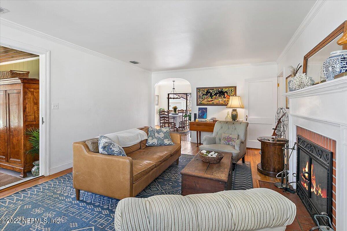 1626 Brookwood Road Jacksonville, FL 32207 - Photo 6 of 27 a living room with furniture and a fireplace