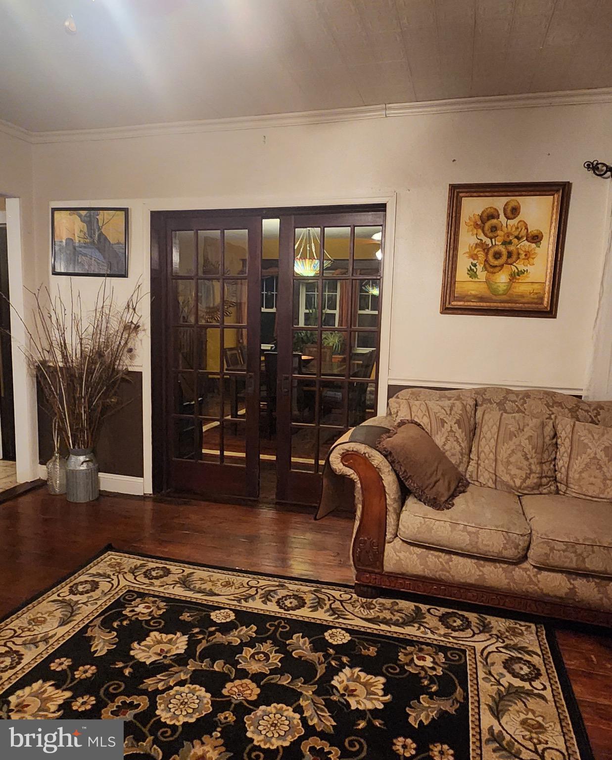 102 Bridgeton Road Elmer, NJ 08318 - Photo 7 of 21 Living Room with Pocket Doors