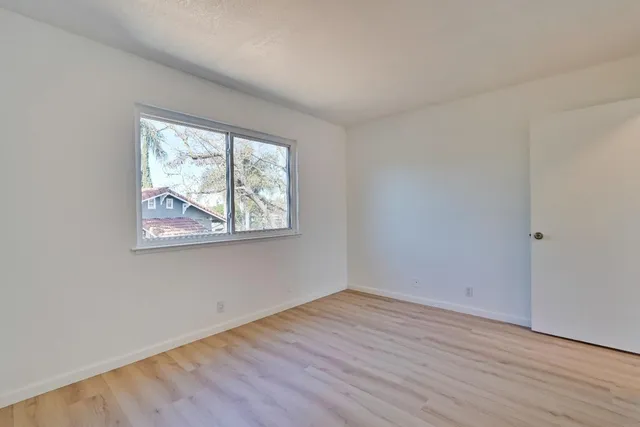a bathroom with a sink vanity and a mirror