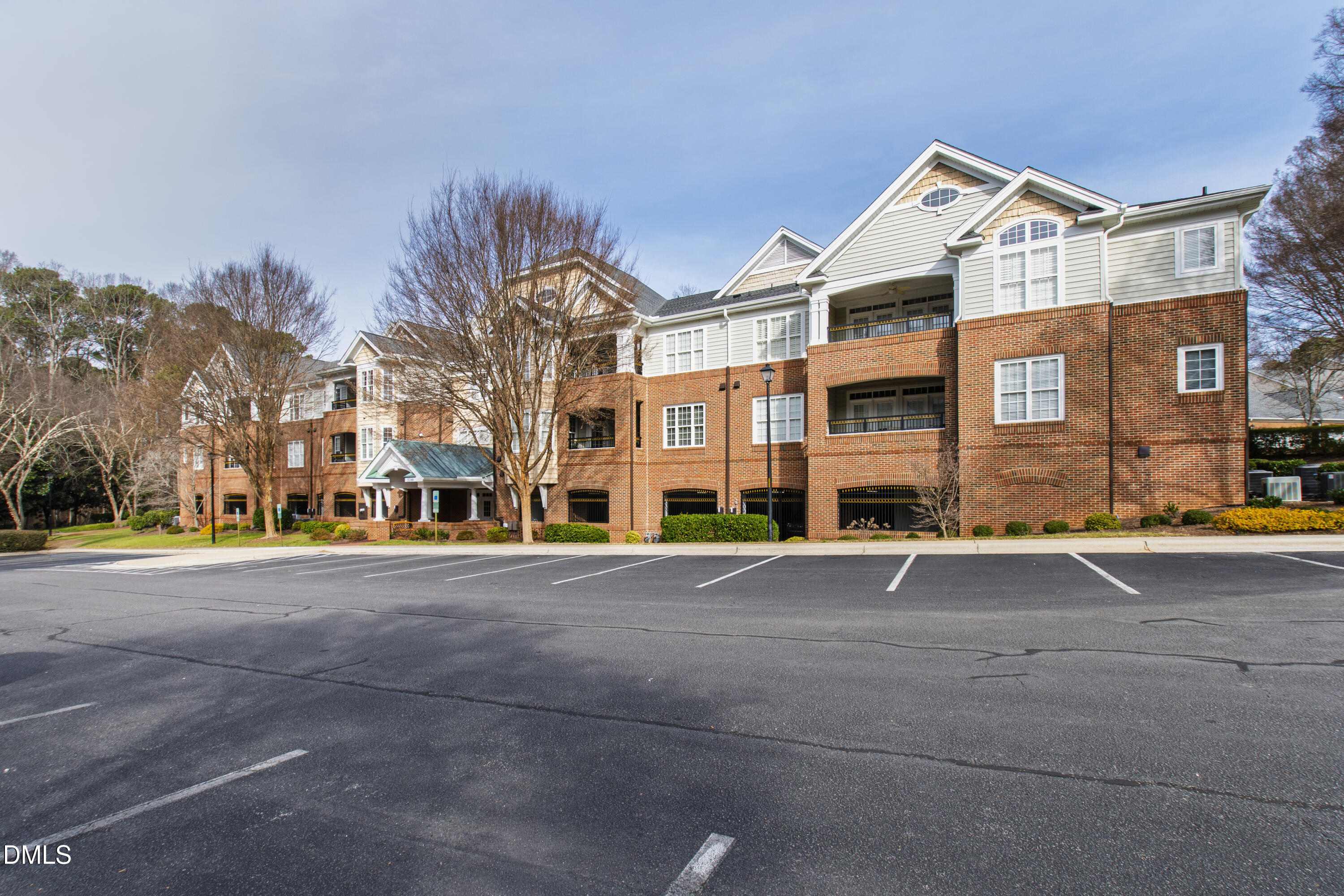 3700 Baron Cooper Pass, Unit 105 Raleigh, NC 27612 - Photo 14 of 49 a view of a building with a street