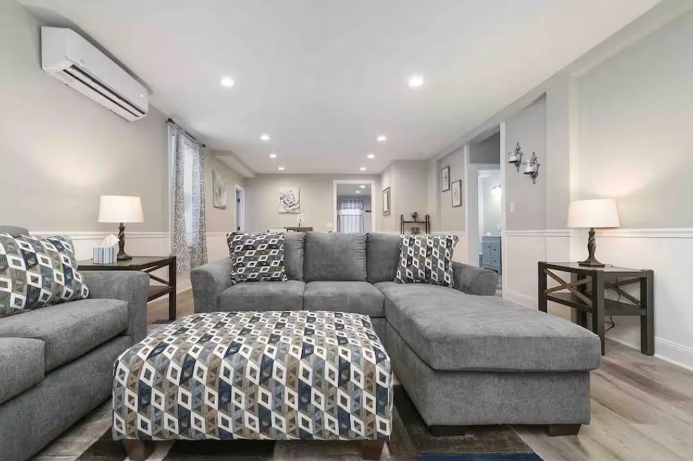 155 Labelle Street, Unit 2 Pittsburgh, PA 15211 - Photo 13 of 22 a large bedroom with a large bed and a couch