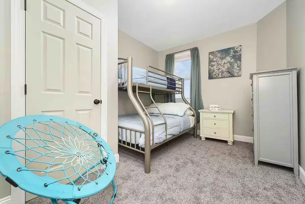 155 Labelle Street, Unit 2 Pittsburgh, PA 15211 - Photo 16 of 22 a bedroom with a bed and a view of living room