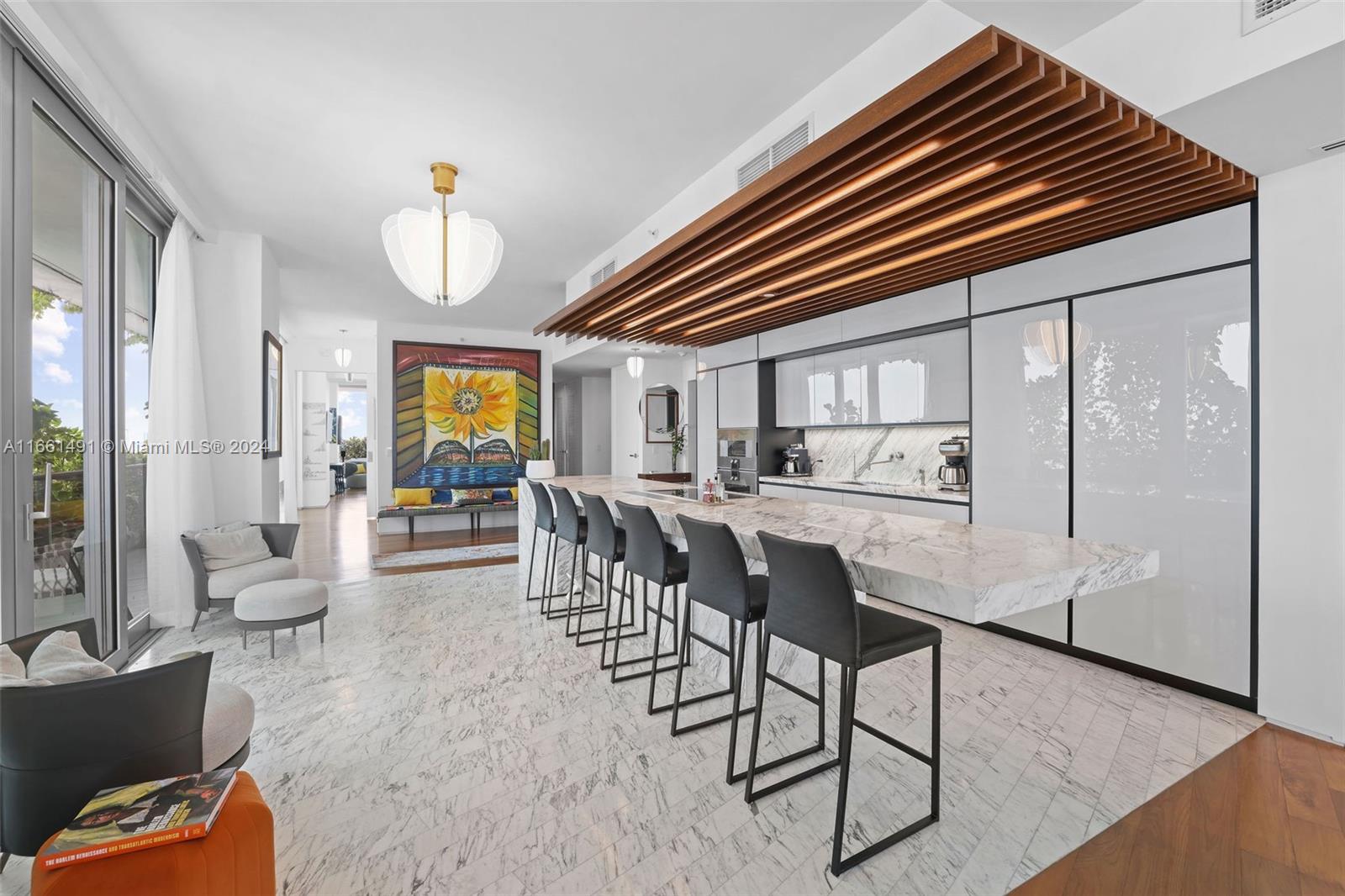 1300 Monad Terrace, Unit 9B Miami Beach, FL 33139 - Photo 20 of 34 a dining room with furniture and wooden floor