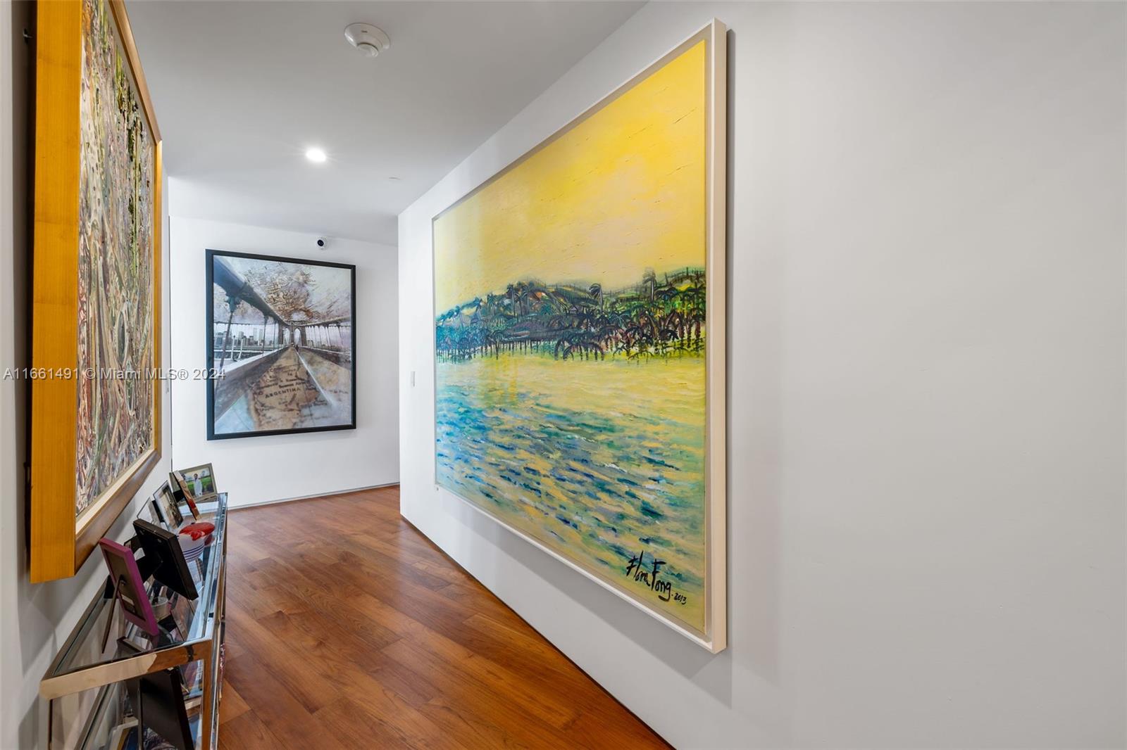 1300 Monad Terrace, Unit 9B Miami Beach, FL 33139 - Photo 21 of 34 an empty room with wooden floor and windows