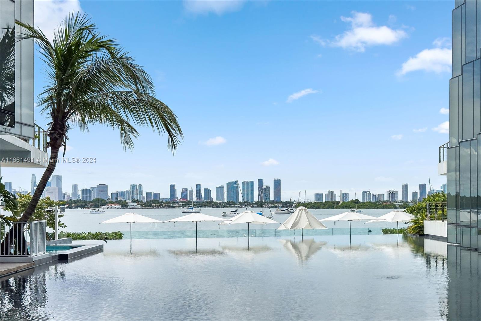 1300 Monad Terrace, Unit 9B Miami Beach, FL 33139 - Photo 30 of 34 a view of swimming pool with outdoor seating and city view